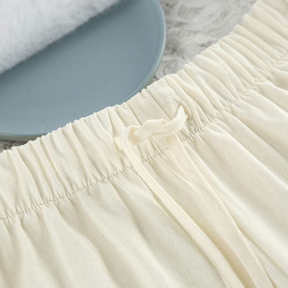 Set pigiama minimalista in cotone a maniche lunghe con tasche. - image 10