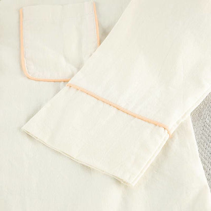 Set pigiama minimalista in cotone a maniche lunghe con tasche. - image 7
