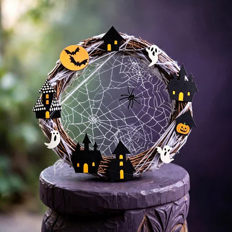 Ghirlanda di rami per Halloween con decorazioni a ragnatela - image 1