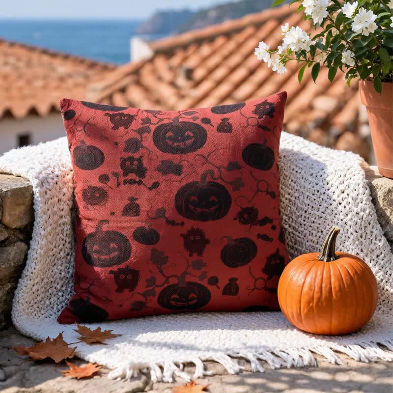 Cuscino in cotone multicolore con zucca e mostro di Halloween - image 1