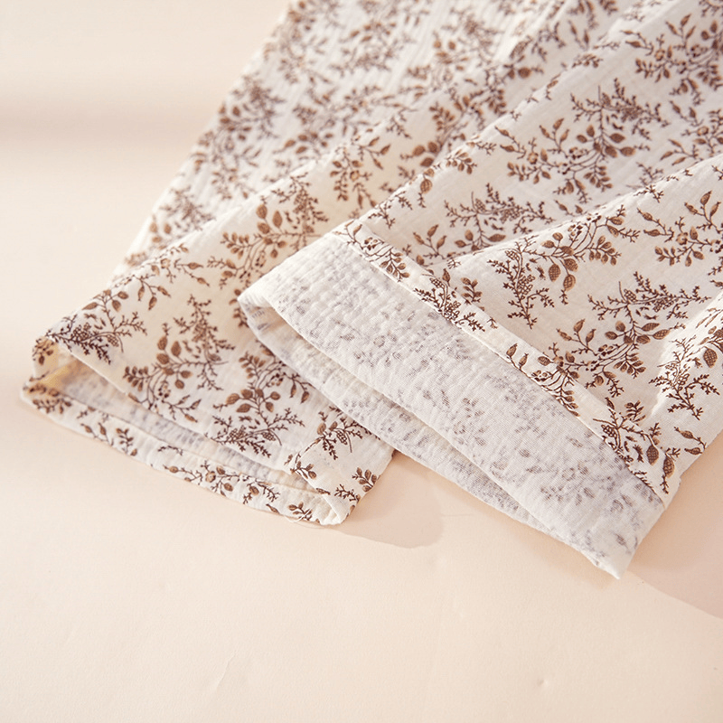 Completo da casa in cotone marrone con stampa floreale. - image 4