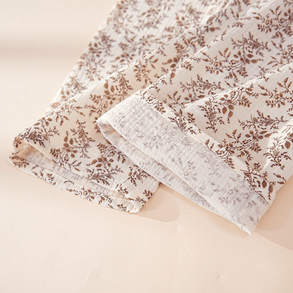 Completo da casa in cotone marrone con stampa floreale. - image 4