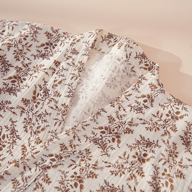 Completo da casa in cotone marrone con stampa floreale. - image 1
