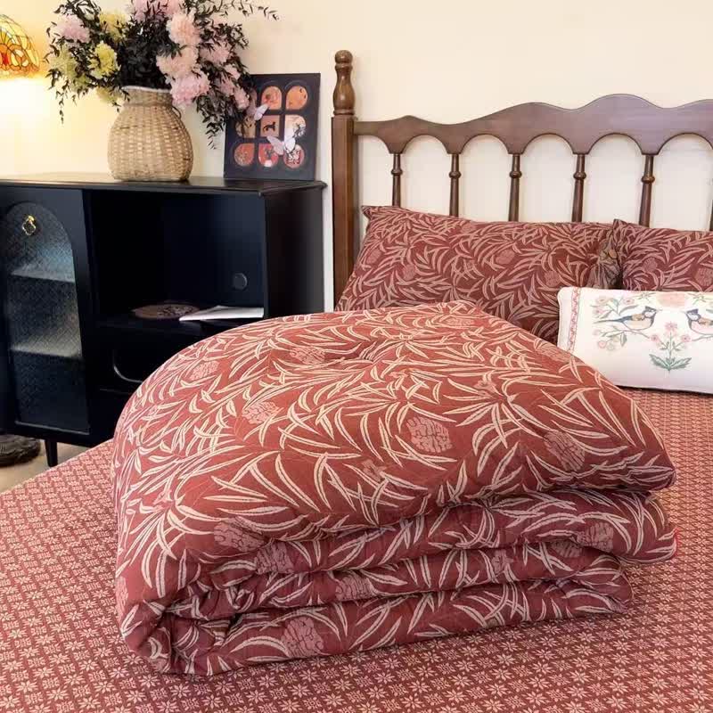 Trapunta reversibile in cotone con motivo floreale botanico - image 10