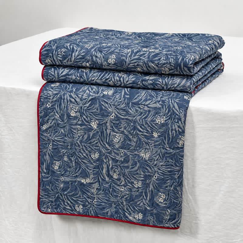 Trapunta reversibile in cotone con motivo floreale botanico - image 1