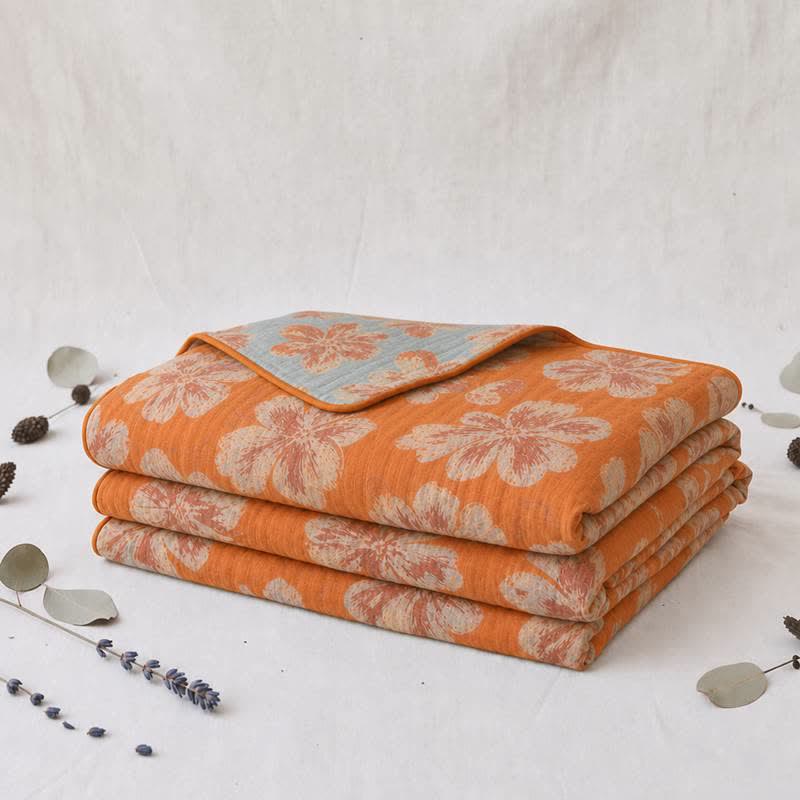 Trapunta reversibile in cotone con fiori arancioni e blu - image 3