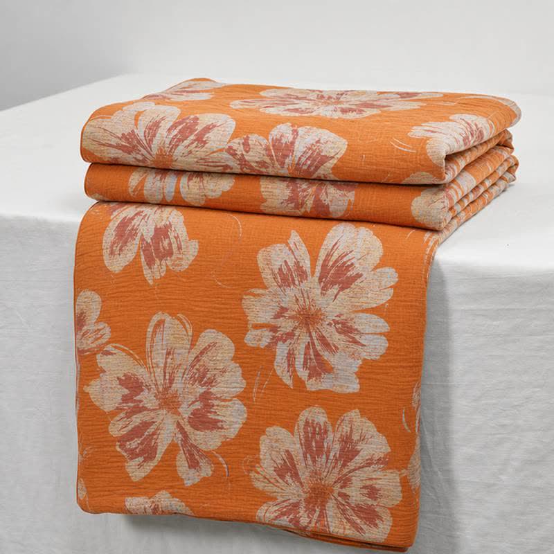 Trapunta reversibile in cotone con fiori arancioni e blu - image 2