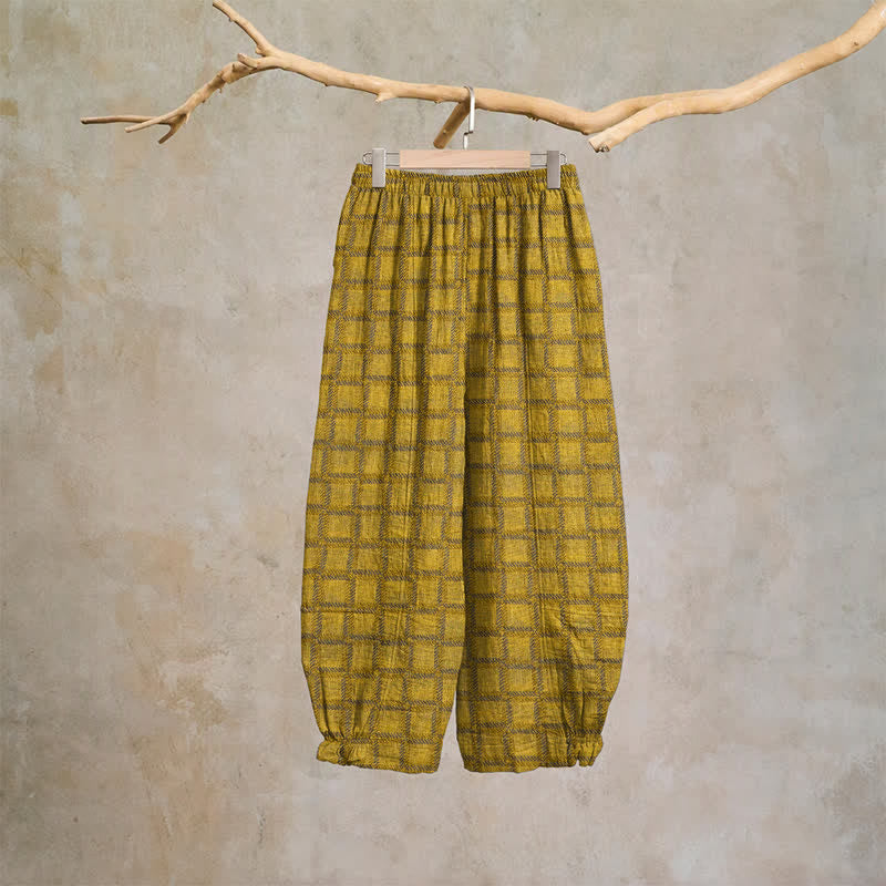Pantaloni harem in garza di cotone a quadri gialli - image 1