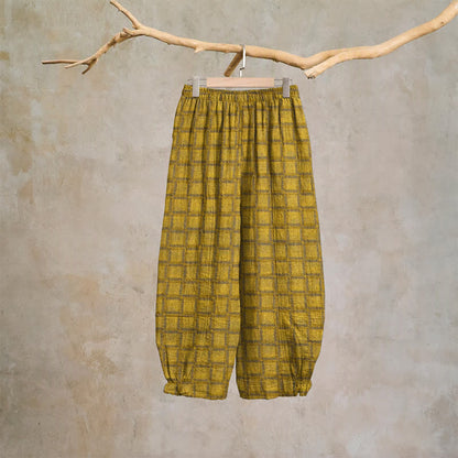 Pantaloni harem in garza di cotone a quadri gialli - image 1