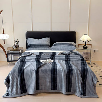 Morbida coperta con motivo a righe geometriche a griglia. - image 37