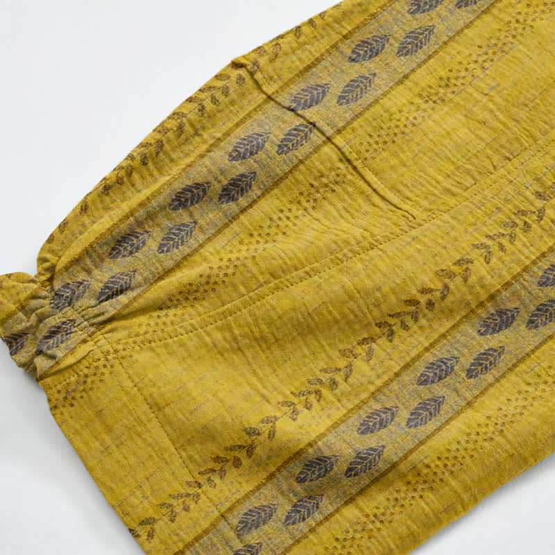 Pantaloni harem in cotone a righe gialle con motivo a foglie - image 5