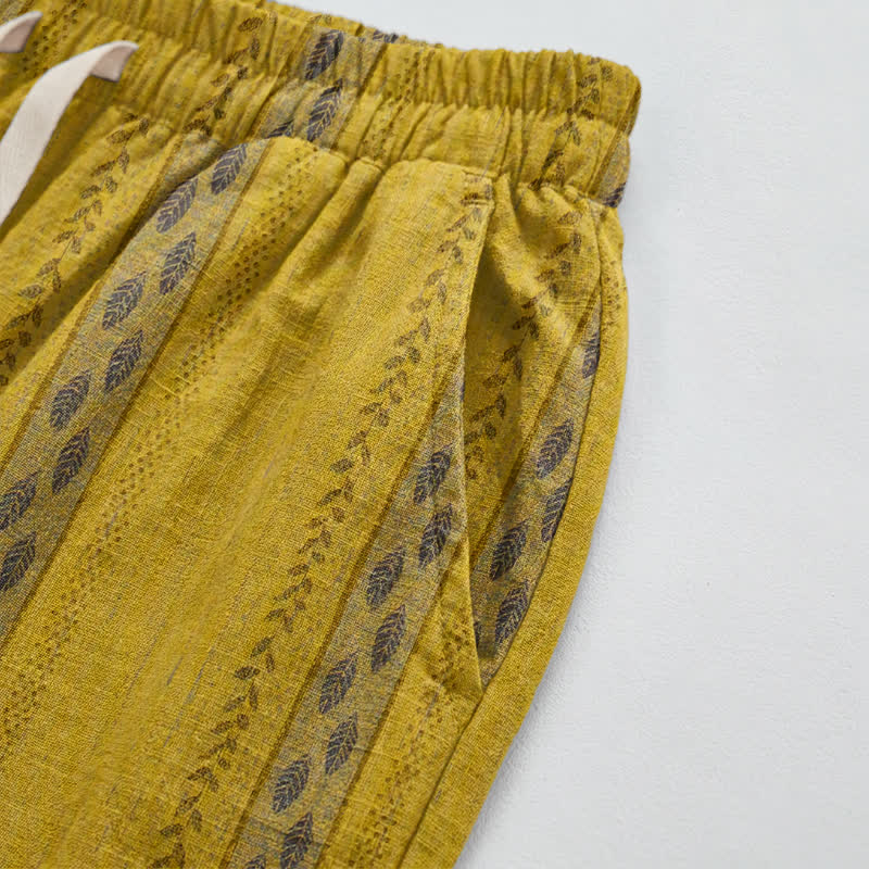 Pantaloni harem in cotone a righe gialle con motivo a foglie - image 4