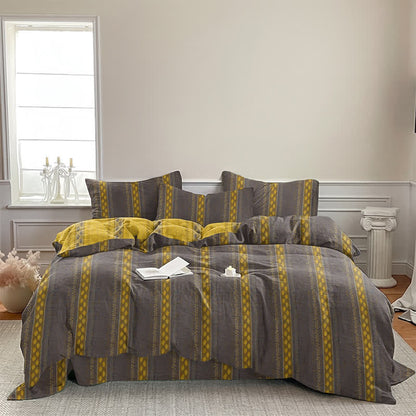 Set di biancheria da letto con copripiumino reversibile in cotone a righe e motivo a foglie. - image 8