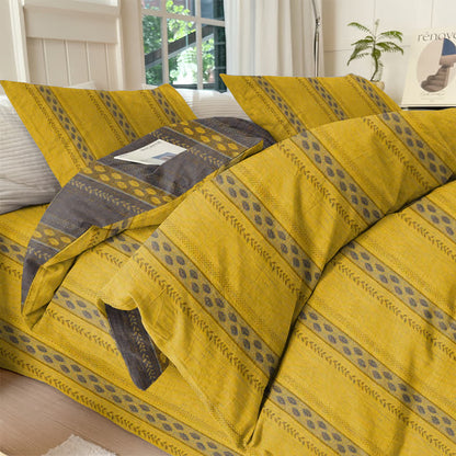 Set di biancheria da letto con copripiumino reversibile in cotone a righe e motivo a foglie. - Giallo - Set di biancheria da letto (4 pezzi) - Matrimoniale Grande - image 0