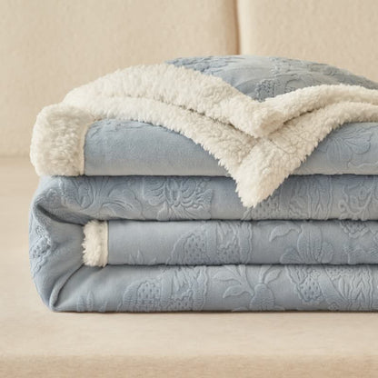 Elegante coperta in pile con motivo floreale in rilievo - image 1