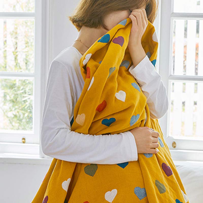 Trapunta reversibile in garza di cotone con cuori colorati