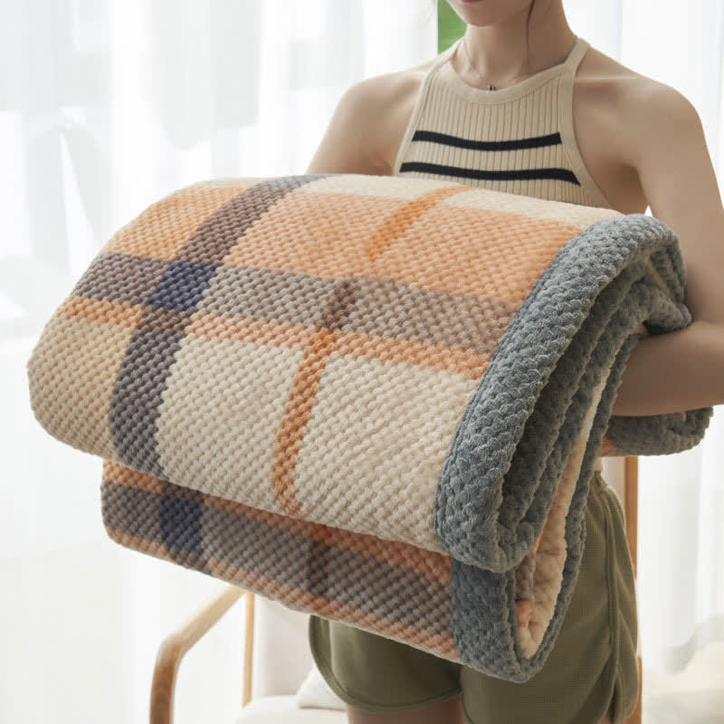 Coperta in pile di corallo caldo a quadri