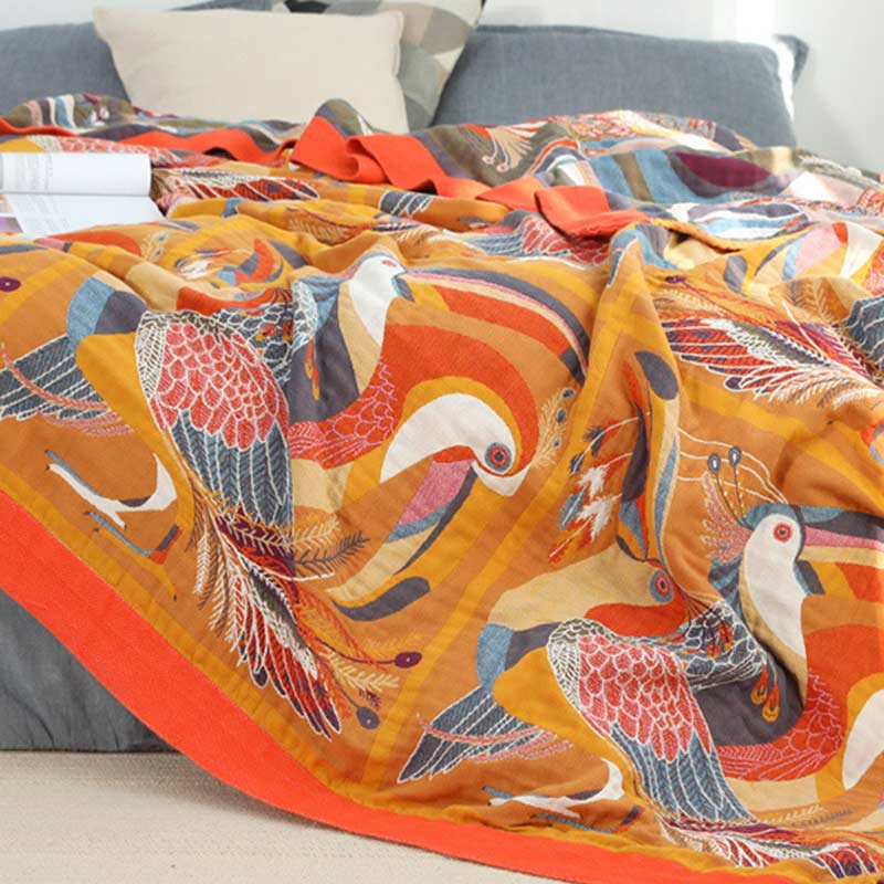 Trapunta reversibile in cotone morbido con motivo tucano