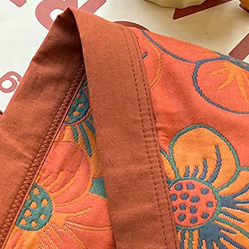 Trapunta reversibile in cotone jacquard con splendido motivo floreale