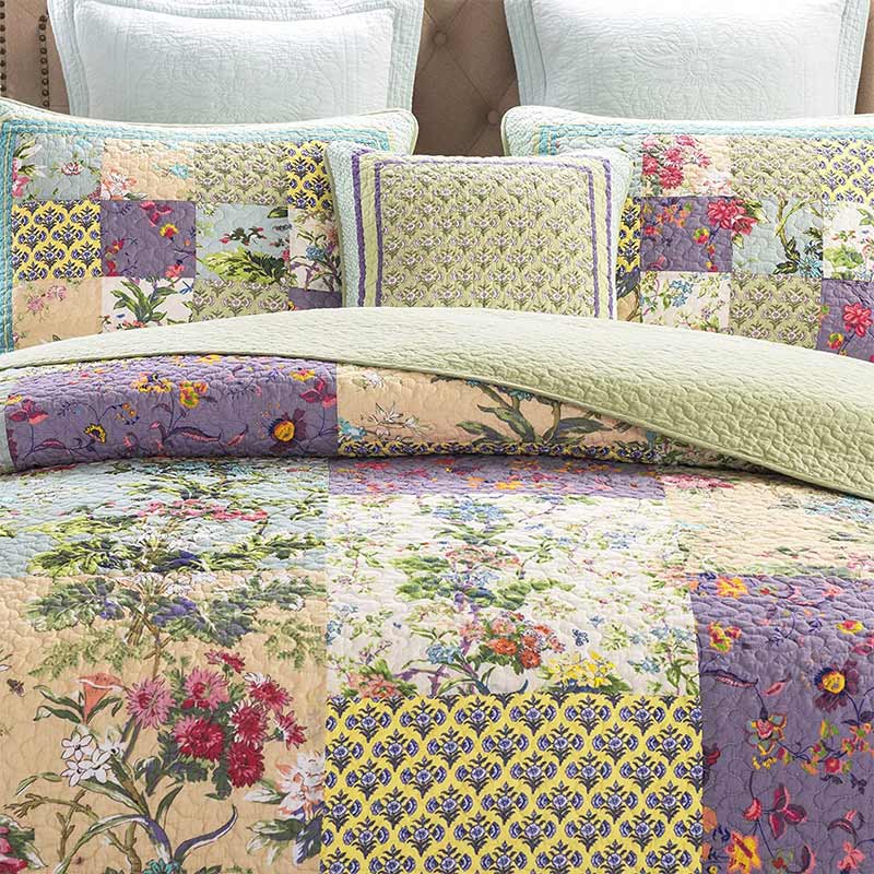 Trapunta floreale patchwork boho con federe
