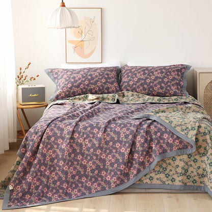 Trapunta reversibile in garza di cotone jacquard floreale