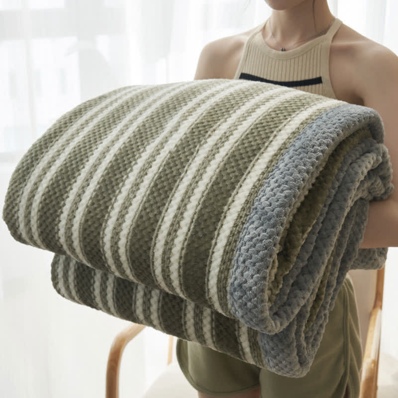 Coperta in pile di corallo a righe