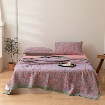 Trapunta reversibile in garza di cotone jacquard a fiori