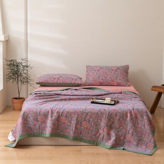 Trapunta reversibile in garza di cotone jacquard a fiori