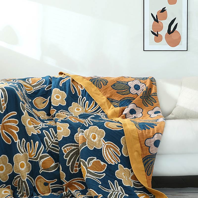 Copridivano con motivo a fiori gialli