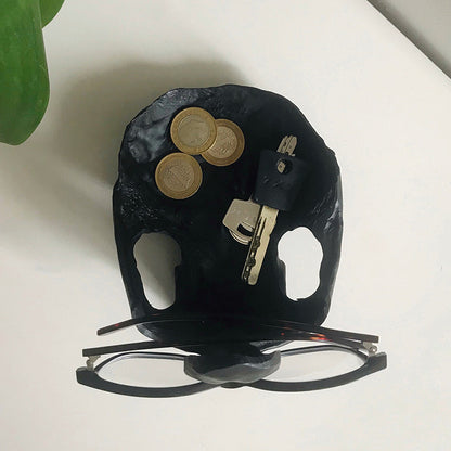 Supporto per occhiali a forma di teschio