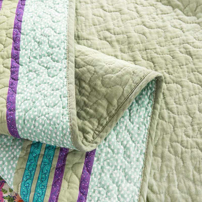 Trapunta floreale patchwork boho con federe