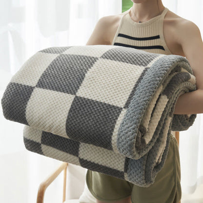 Coperta in pile di corallo caldo a quadri