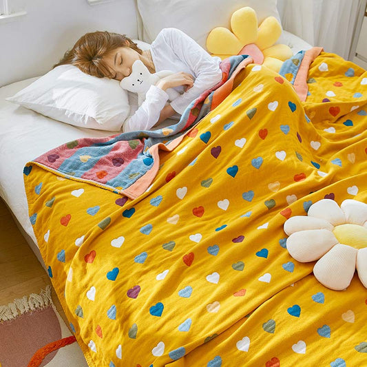 Trapunta reversibile in garza di cotone con cuori colorati