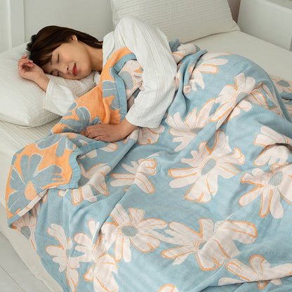 Trapunta reversibile in morbido cotone stampato con margherite