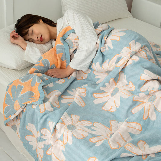Trapunta reversibile in morbido cotone stampato con margherite
