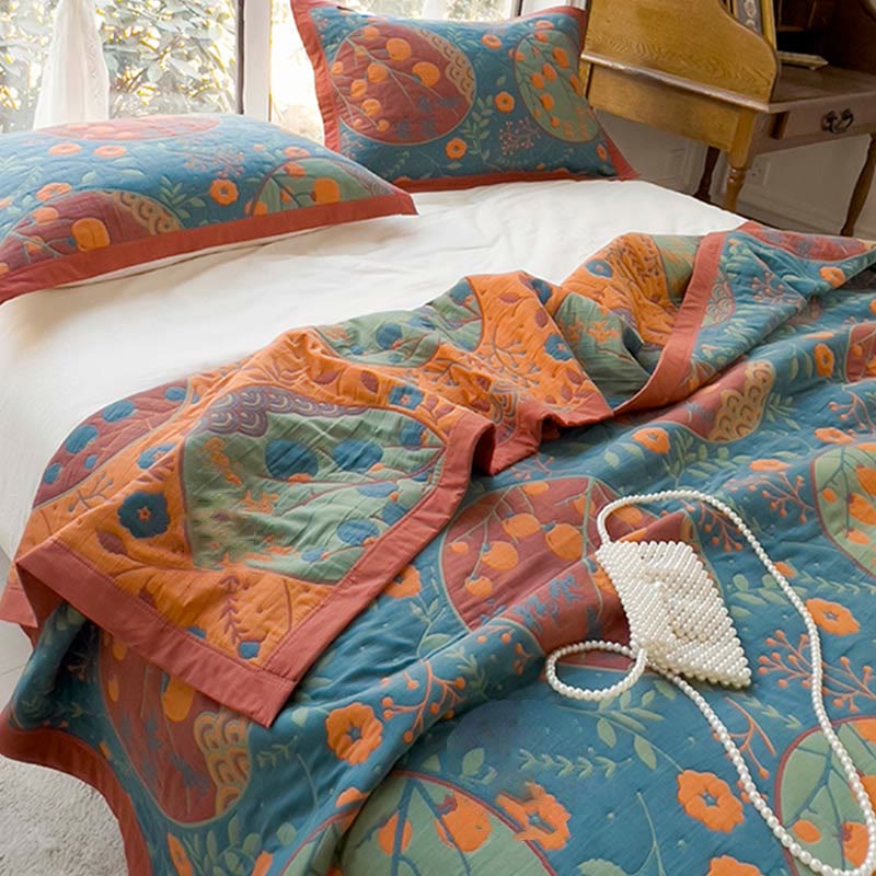 Trapunta doppia in cotone con fiori di cachi