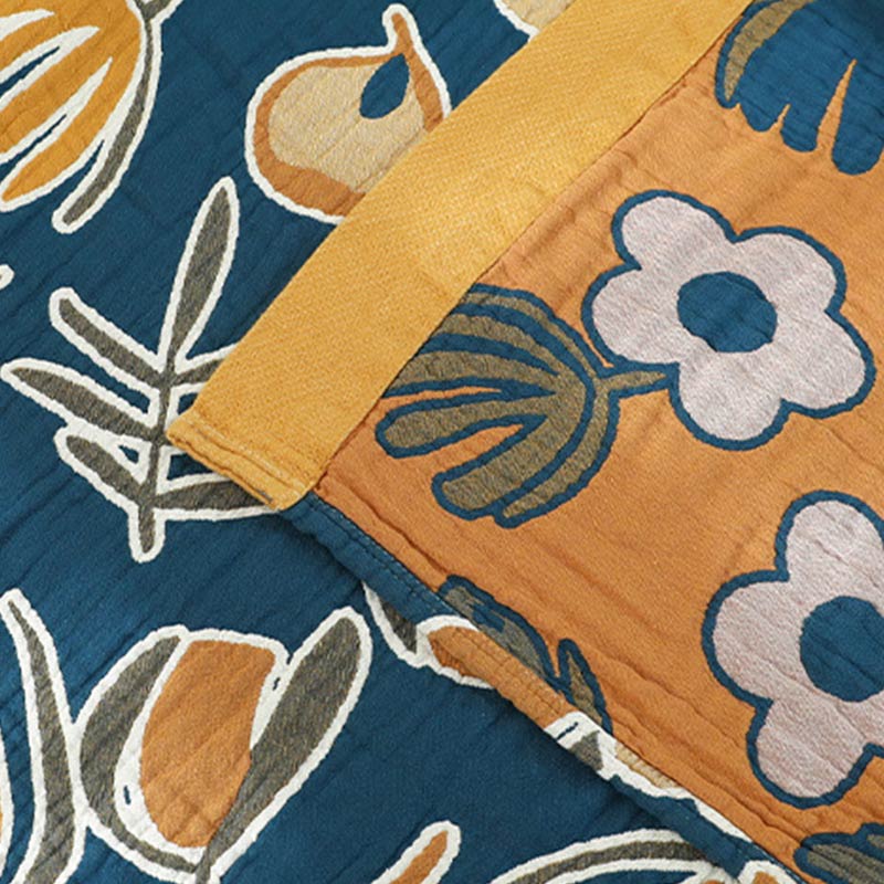 Copridivano con motivo a fiori gialli