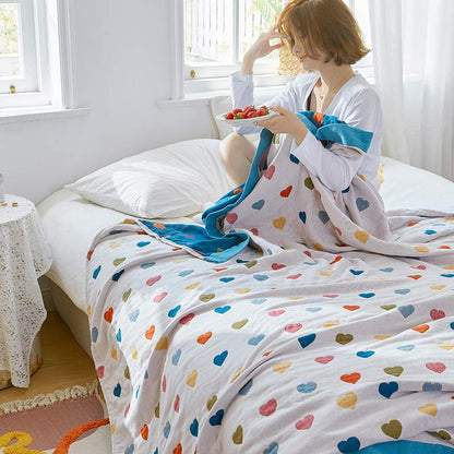 Trapunta reversibile in garza di cotone con cuori colorati