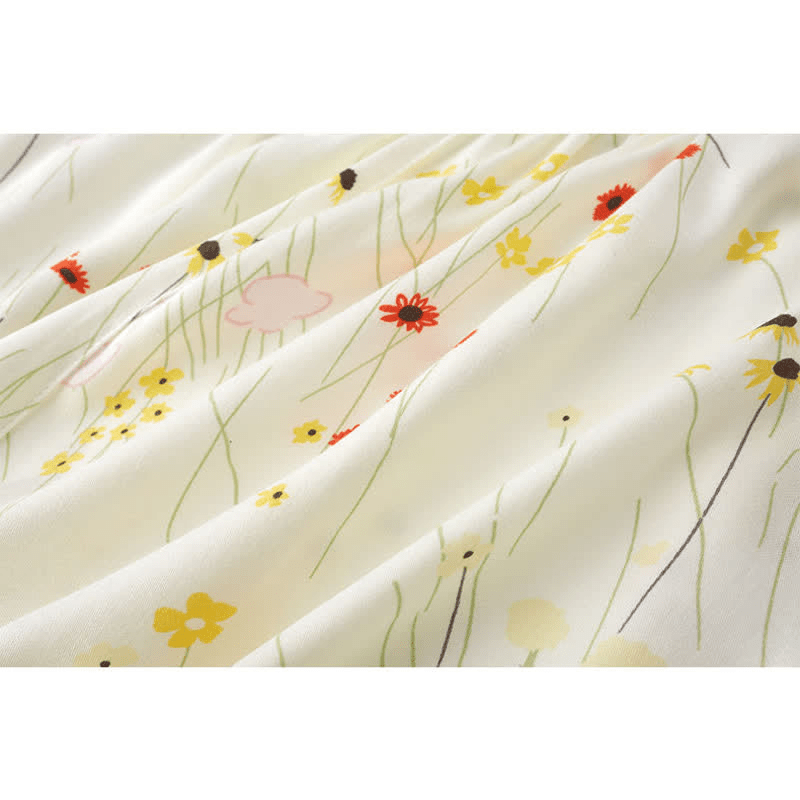 Completo da casa traspirante con scollo a V e motivo a fiori e foglie