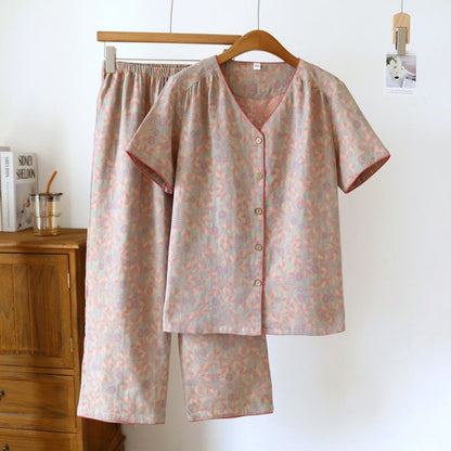 Completo da casa in cotone con bottoni e scollo a V