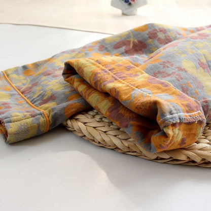 Completo da casa in cotone con risvolto a margherita gialla