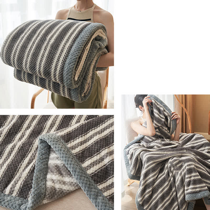 Coperta in pile di corallo a righe