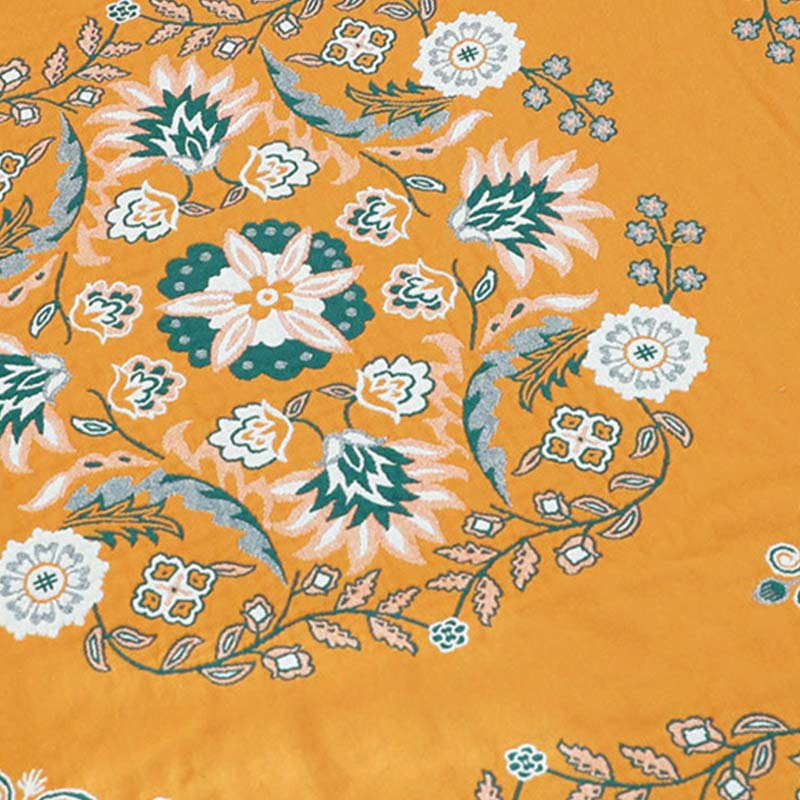Trapunta reversibile con motivo Ownkoti e motivo a fiori