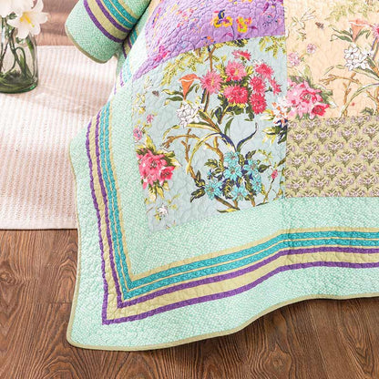 Trapunta floreale patchwork boho con federe