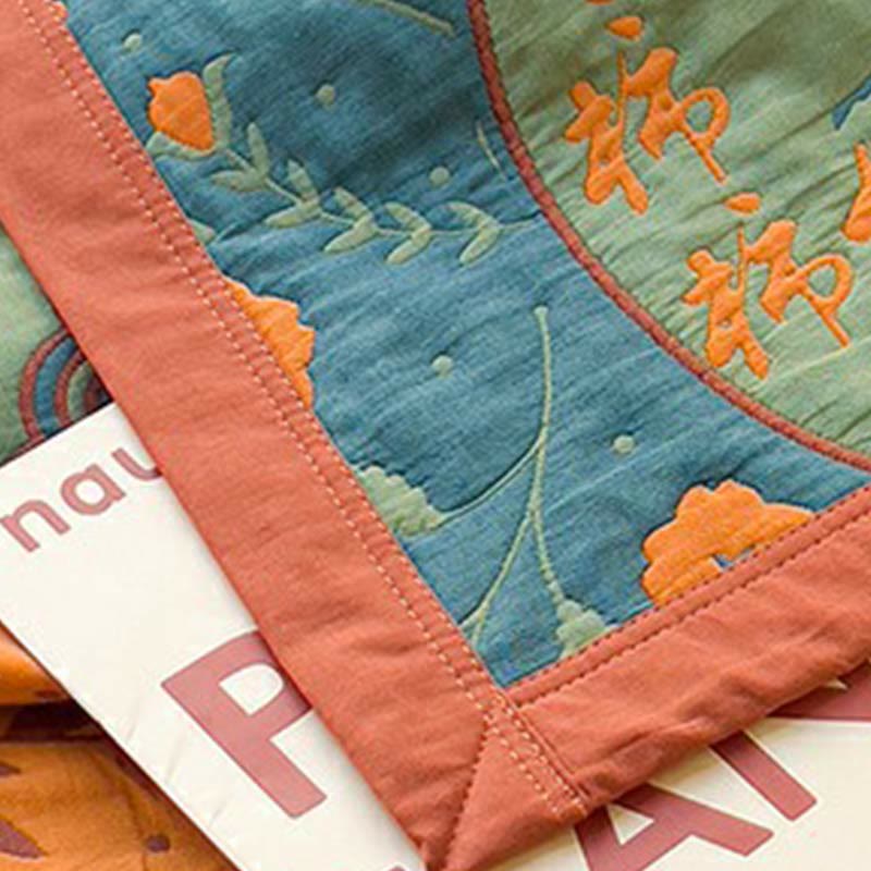 Trapunta doppia in cotone con fiori di cachi