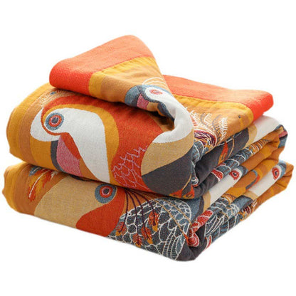 Trapunta reversibile in cotone morbido con motivo tucano