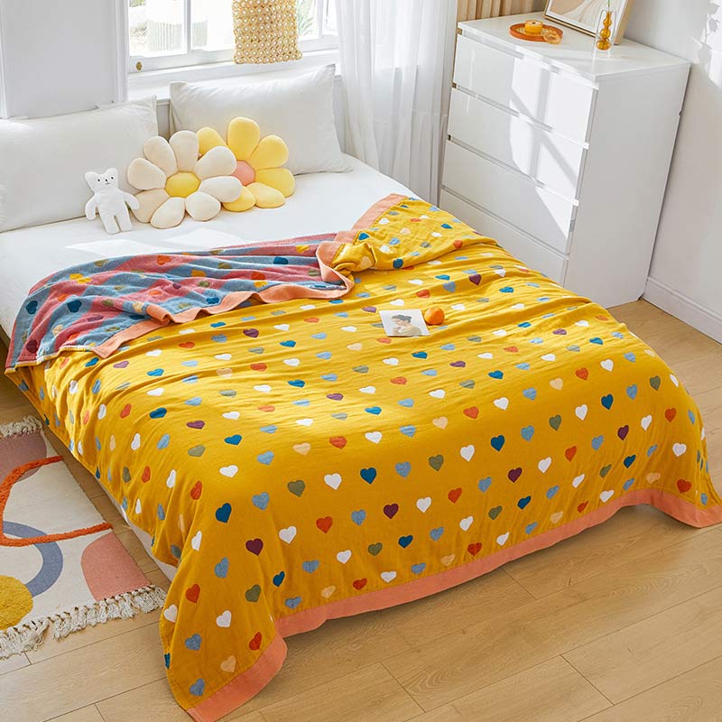 Trapunta reversibile in garza di cotone con cuori colorati