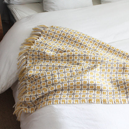Coperta per divano lavorata a maglia Ownkoti con nappe