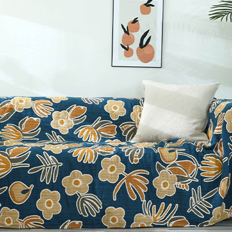 Copridivano con motivo a fiori gialli
