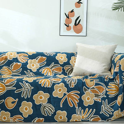 Copridivano con motivo a fiori gialli